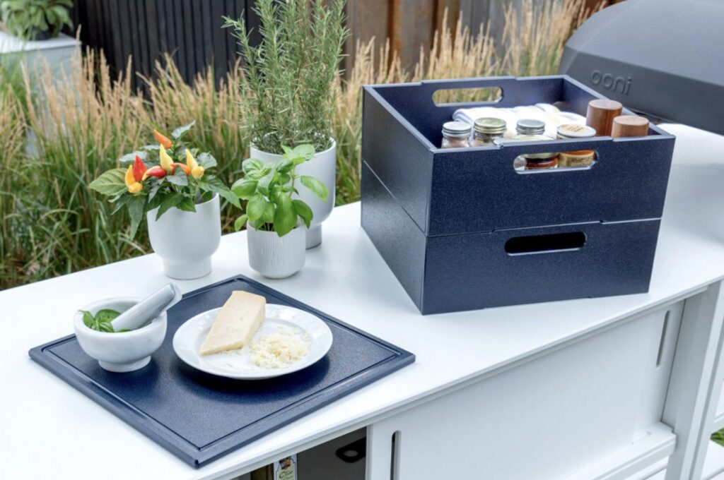The A La Carte Tray in Navy Blue along with fresh herbs and cheese